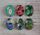 Handmade oval Photo Glass Cabochons feather A304